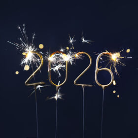 New Year 2026 Numbers Made With Glowing Sparklers On Dark Background.